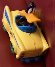 Small Daffy Duck In A Car